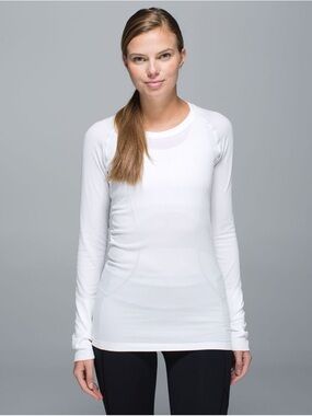 Lululemon Swiftly Tech Long Sleeve in White. Hip Length. Size 4